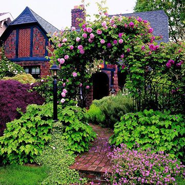 Tudor Curb Appeal. I'd love to see this every morning while I have my coffee. I just would need a yard BOY! Please!!  Haha Cottage Front Yard, Tudor Cottage, Brick Walkway, Tudor Style Homes, English Tudor, Brick Exterior House, English Cottage Garden, Tudor House, Casa Exterior