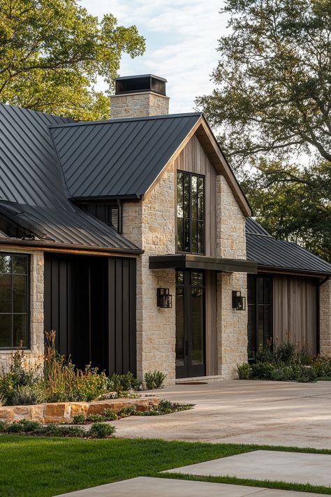 Discover 20 Modern Farmhouse Exteriors That Will Wow You - Country Modern Home Exterior, House With Grey Metal Roof, One Story Modern Farmhouse Exterior, Modern Farmhouse Designs, Modern Farmhouse With Stone, Modern Farmhouse Exteriors, Modern Rustic Exterior House, Industrial Farmhouse Exterior, Rambler Exterior