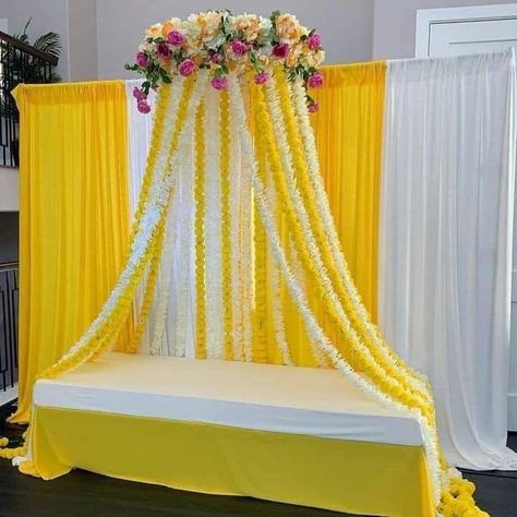 Haldi Ceremony Decorations At Home, Noozay Decor, Mehndi Decoration Ideas At Home, Mehndi Decoration Ideas, Haldi Decoration Ideas, Haldi Ceremony Decorations, Small Wedding Decor, Mehendi Decor Ideas, Simple Stage Decorations