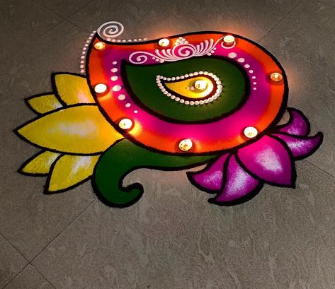 #rangoli #art #beautiful #colours #colourart #homedecore #indiantradition #indianart #simple #pretty #homedecore #festivalideas #happydiwali #festivedecore #diwali #diwaliideas #lightrangoli #diwalilights #lightsdecore #trending #decorationidea #trendingideas #festiveideas #festivalmood Rangoli Ideas Simple And Easy, Ohp Sheet Rangoli Design, Aesthetic Small Rangoli, Small Beautiful Rangoli, Simple Round Rangoli, Diwali Rangoli Ideas Easy Small Design, Rangoli For Diwali 2024, Aesthetic Rangoli Designs For Diwali, Small Rangoli Design For Diwali