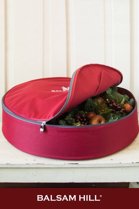 Keep your wreaths in lovely shape and looking great season after season with sturdy storage bags. These wreath storage bags feature an inner hanger and curved carrying handle to keep foliage in a stable upright position. #BalsamHillUK #ChristmasDecor #ChristmasTree #ChristmasIdeas #ChristmasStocking #ChristmasDesign #HomeDecor #Interior #InteriorDesign #Home #Design #Fall #Autumn #Inspiration #Wreath #Garland #UK #Ireland Christmas Tree Storage Box, Christmas Wreath Storage, Christmas Tree Tote, Christmas Tree Storage Bag, Ornament Storage Box, Wreath Storage, Christmas Tree Storage, Ornament Storage, Artificial Christmas Wreaths