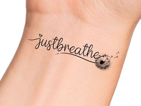 Just Breathe Dandelion Temporary Tattoo Size: The size of this Temporary Tattoo is approximately 2 inches in length. If you would like this design in a smaller or larger size that isn't already listed, please message us directly on Etsy BEFORE placing your order so we can provide you with accurate pricing. Directions: 1.    Peel off the clear plastic layer with your fingernail or a pair of tweezers. Hold the temporary tattoo design side up in your hand and with your other hand run your thumb alo Just Breathe Dandelion Tattoo, Girly Finger Tattoos, Letting Go Tattoo Ideas, Tattoo Music Ideas, Small Finger Tattoos For Women, Just Breathe Tattoos For Women, Breath Tattoo, Mama Tattoos, Breathe Tattoos