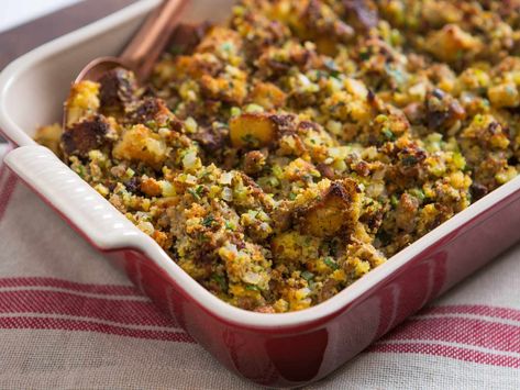 Adding oysters to Thanksgiving stuffing may sound like an odd choice, but it's a practice with a long history and delicious results. Here, raw chopped oysters are mixed with toasted unsweetened cornbread, sausage, and aromatic vegetables and herbs. The oysters add a wonderful savory flavor and subtle brininess. Dressing Stuffing, Thanksgiving Bread, Sausage And Mash, Cornbread Dressing Southern, Dressing Recipes Cornbread, Cornbread Stuffing, Thanksgiving 2022, Sausage Stuffing, Perfect Turkey