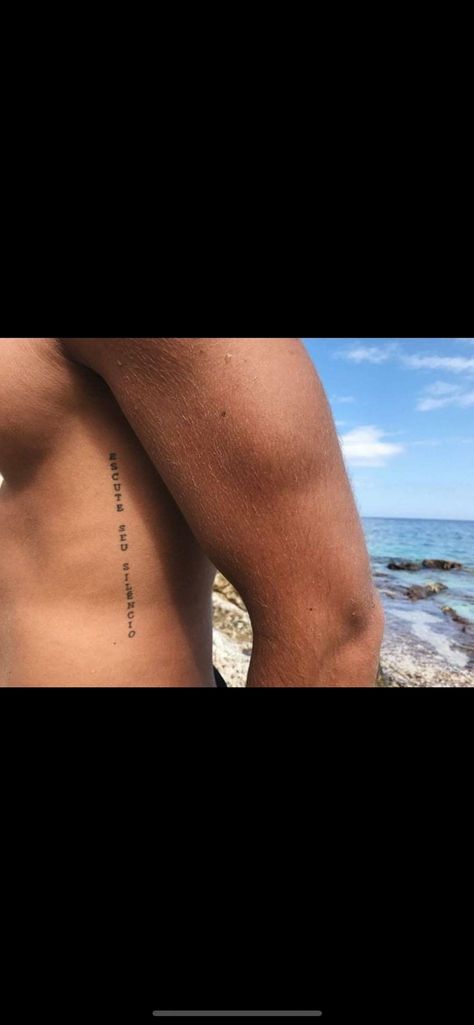 Men’s Rib Cage Tattoo, Vertical Rib Tattoo Men, Spanish Tattoos Men, Tattoo Ribs Men, Rib Tattoos Men, Mens Rib Tattoo Ideas, Quad Tattoo For Men, Small Side Tattoo, Tattoo Ideas For Men Leg