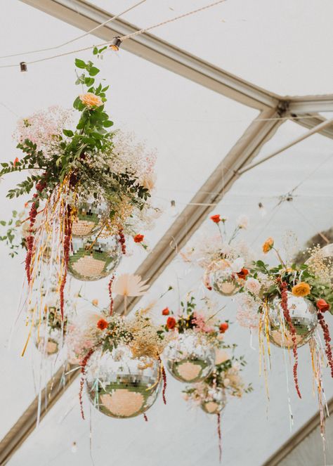 Elegant Winter Wedding With A Disco Ball Ceiling | Junebug Weddings Fall Disco Ball, Wedding Tent Disco Ball, Flower Disco Ball, Ceiling Flowers Wedding, Floral Ceiling Wedding, Floral Disco Ball, Reception Outfit Change, Disco Ball Ceiling, Disco Wedding Theme