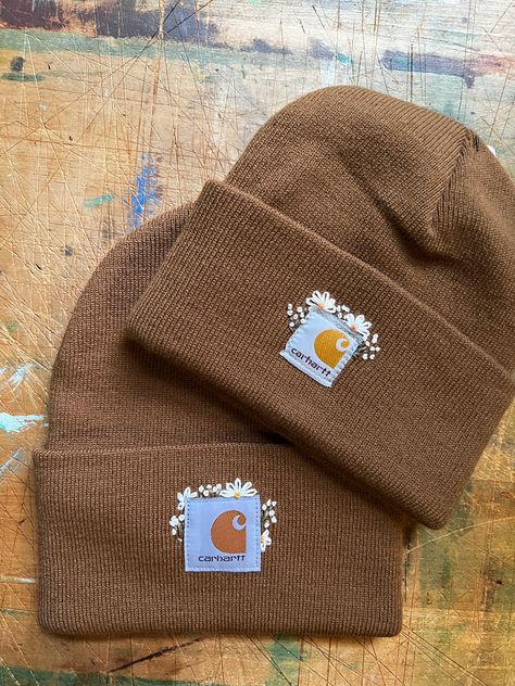 Embroidered Items That Sell, Cathartic Hat Embroidered, Embroider Beanie Diy, Embroidered Carhartt Beanie Flowers, Bandana Embroidery Ideas, Diy Embroidered Beanie, How To Embroider A Beanie, Carhartt Embroidery Diy, Beanie Hand Embroidery