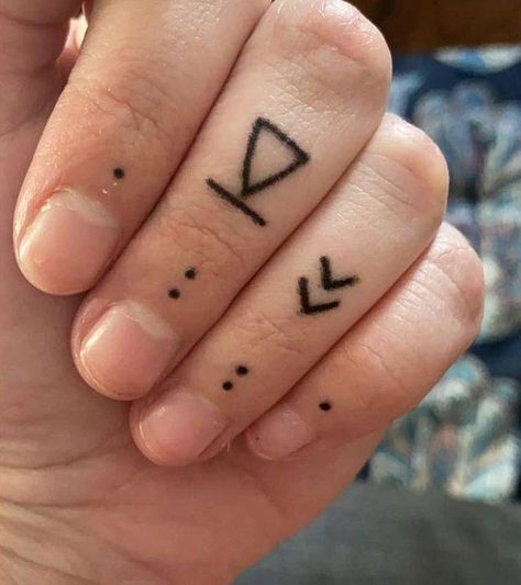 DIY Ink: What Do You Need for Stick and Poke Tattoos? Stick And Pike Ideas Small, Stick N Poke Finger, Small Stick And Poke Tattoo Ideas Simple, Arm Stick And Poke Tattoo, Stick And Poke Tattoo Finger, Skull Stick And Poke, Goth Stick And Poke Tattoo, Small Tattoos Stick And Poke, Matching Stick And Poke Tattoo