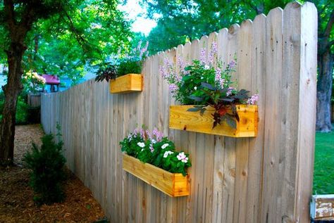 25 Space Saving Ideas Creating Beautiful Balcony Designs, Porch Decorating with Modern Hanging Planters Hanging Plants On Fence, Tractor Planter, Fence Hanging Planters, Diy Cedar Planter Box, Wooden Tractor, Hanging Planter Boxes, Diy Wooden Planters, Backyard Planters, Outdoor Planter Boxes