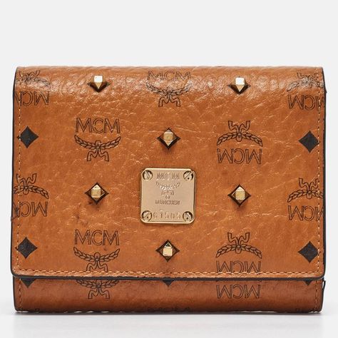 This Stylish And Functional Wallet By Mcm Is A Must Have. Crafted From Durable Signature Coated Canvas, It Has A Lovely Hue. It Has A Front Flap That Opens To A Fabric Interior With Enough Space To Hold Your Essentials. High Heel Rain Boots, Mcm Bags, Lingerie Bag, Backpack Tote Bag, Trifold Wallet, Luxury Vintage, Facial Skin Care, Handbag Backpack, Vintage Boutique