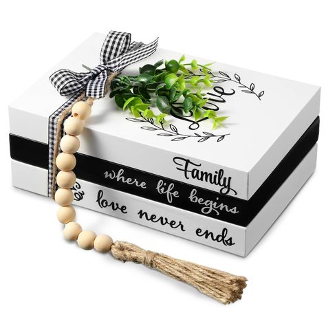 PRICES MAY VARY. What You Get: you will receive a decorative faux books set, it reads [family], [where life begins], [love never ends], 1 string of farmhouse beads with tassels, 1 piece black and white buffalo plaid ribbon, and 1 piece artificial leaf, suitable for a variety of home decoration Quality Material: wooden fake books are made of wood material, not easily broken or faded, they look like realistic books, the beads are both made of quality wood, have no peculiar smell, serving you for a Diy Book Decor, Diy Wood Books, Small Living Room Designs, Fake Books Decor, Stack Displays, Wood Books, Fake Books, Farmhouse Beads, Stacked Books