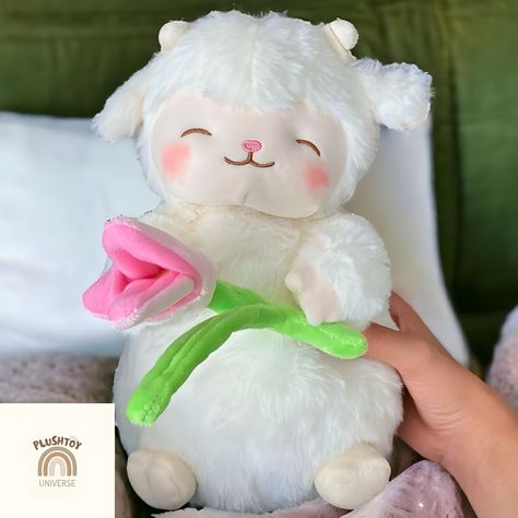 Bring joy and cuddles to your little one with our Sheep Tulip Plush Toy! 🌷🐑 🎨 Adorable Design: This charming plushie features a cute sheep nestled in a tulip flower, combining two beloved symbols of sweetness and springtime. 💖 Soft and Fluffy: Made from plush and cotton materials, it's irresistibly soft and perfect for snuggling. 🌸 Vibrant Colors: Available in a delightful palette of white, pink, and green, adding a pop of color to any nursery or playroom. 📏 Perfect Size: With a height of 26cm, it's just the right size for little hands to hug and hold. 🎁 Thoughtful Gift: Whether for a birthday, baby shower, or just because, this plush toy makes a wonderful and memorable gift for kids of all ages. Add a touch of whimsy and warmth to your child's world with our Sheep Tulip Plush Toy! Pink Sheep, Sheep And Lamb, Cute Sheep, Flower Soft, Tulip Flower, Tulips Flowers, Gift For Kids, Toys Gift, Plush Dolls