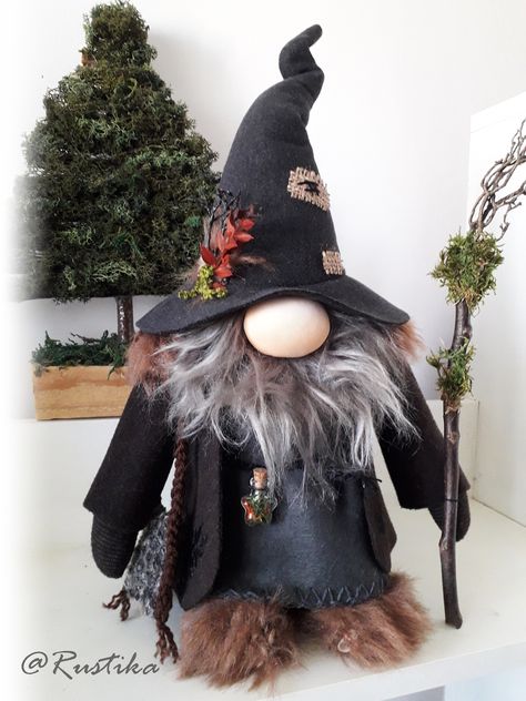 NOTE: This item is made to order, your gnome will be very similar, but not identical with the pictured one. Fergus is a gnome who has lived all his life in a forest and now he is looking to retire somewhere, in a welcoming house, where he can have enough peace and attention. He is very good at making potions from medicinal plants, he always carries a bottle with the necessary things, carefully collected by him, on his arm. He is about 15.6 inches tall, wears clothes made of woolen and knitted fa Gnome Cottage, Making Potions, Gnome Wizard, Wizard Gnome, Gnome Halloween, Core Decor, Cottage Core Decor, Grey Beards, Nordic Gnomes