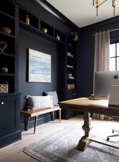 Saving the best for last. Inkwell by Sherwin Williams is one we have used in our own home and love it! Inkwell is a deep, moody blue that looks great used as an accent wall or even entire rooms such as an office. #homeoffice #bookcase #builtins #darkoffice #desk Zimmer Diy, Interior Kantor, Office Built Ins, Dark Paint Colors, Wall Bookshelves, Office Colors, Built In Bookcase, Home Office Space, Home Library