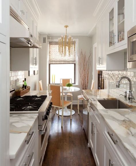 Small Galley Kitchen via Trendir Galley Kitchen Remodel Ideas, Saarinen Dining Table, Small Galley Kitchen, Galley Kitchen Design, Galley Kitchen Remodel, Galley Kitchens, Narrow Kitchen, Manhattan Apartment, Galley Kitchen