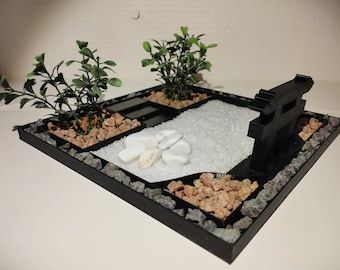 Immerse yourself in the timeless tranquility of a Japanese Zen Garden, meticulously crafted to bring peace into your life wherever you are. Our Handcrafted Zen Garden Kit is not merely a product; it is your gateway to serenity, an invitation to embark on a journey of meditation and relaxation. Lego Zen Garden, Jardin Zen Miniature, Desktop Zen Garden, Miniature Zen Garden, Japanese Zen Garden, Garden Kit, Japanese Zen, Garden Planter, Garden Kits