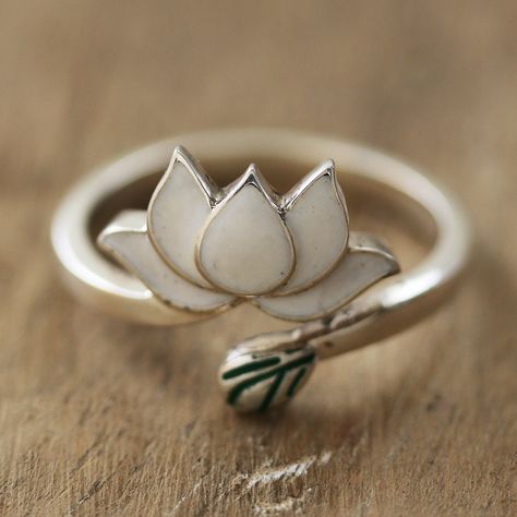 Indian designer Sapna Mehta draws inspiration from lotus flowers to create a charming accessory for the everyday. Crafted by local artisans, this sterling silver wrap ring comes in a polished finish and features a lotus bloom, symbolizing resilience and rebirth. Lotus Flower Ring, Lotus Ring, Wood Dangle Earrings, Lotus Jewelry, Silver Wrap Ring, Flower Engagement Ring, Platinum Wedding Rings, Sterling Silver Cat, Lotus Flowers