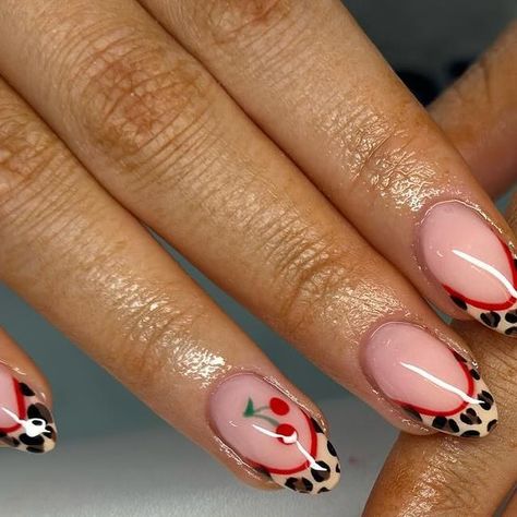 Meghan on Instagram: "I love this trend 🐆🍒 .  . . #lepoardprint #cheetahnails #cherrynails #showscratch #nailsofinstagram #nails #naildesigns #nail_me_good_ #nailinspo #nailsaddict #nailobsession #nailsswag #nailitmag #acrylicnails #scratchmagazine" Gel Mani Designs Art Ideas, Cherry Leapord Nails, Cherry Lepord Nails, Cheetah Nails With Cherries, Cherry And Leopard Nails, Fun Dark Nails, Nails Design Western, Cheetah Print Acrylics, Leopard Print Nails With Cherry