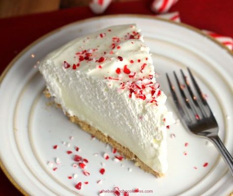 Holiday White Chocolate Peppermint Cheesecake Mousse Pie White Chocolate Peppermint Cheesecake, Chocolate Peppermint Cheesecake, Holiday Pies Recipes, Chocolate Silk Pie, Mousse Pie, White Chocolate Peppermint, Peppermint Cheesecake, Christmas Pie, Peppermint Cream