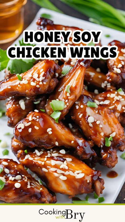 These Honey Soy Chicken Wings are the ultimate crowd-pleaser! Marinated in a sweet and savoury honey soy sauce, these wings are baked to perfection, delivering tender meat with a sticky, caramelised coating. Perfect for game day, parties, or as a delicious snack, these wings are sure to be a hit with family and friends. Easy to prepare and full of flavour, they are a must-try for any chicken wing lover. Serve with a sprinkle of sesame seeds and fresh spring onions. Honey Soy Sauce Chicken, Soy Chicken Wings, Soy Sauce Chicken Wings, Sweet Chicken Wings, Honey Soy Chicken Wings, Chicken Wing Marinade, Bbq Chicken Wings Recipe, Roasted Chicken Wings, Honey Soy Chicken