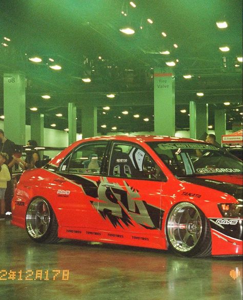 Evo from tokyo drift on film. Photographer unknown Tokyo Drift Birthday Party, Fast And Furious Tokyo Drift Wallpaper, Tokyo Drift Aesthetic Wallpaper, Drift Car Interior, Han Lue Tokyo Drift, Tokyo Drift Wallpaper, Tokyo Drift Aesthetic, Cars Hello Kitty, Carros Drift