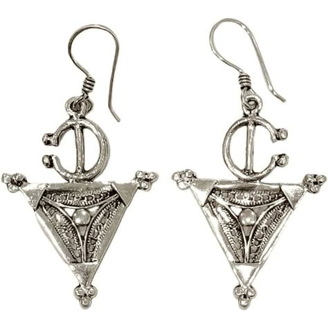 The cultural richness of the Moroccan Silver Earrings, featuring a traditional Berber cross. Handcrafted by Amazigh artisans, perfect for gifting & daily wear.... https://giftsmorocco.com/product/handmade-moroccan-silver-earrings-ethnic-artisan-craft/ Boho Gifts, African Culture, Traditional Crafts, Cross Designs, Silver Gifts, Artisan Craft, Earring Gifts, Meaningful Gifts, Morocco