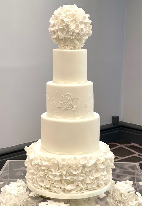 Elegant white wedding cake with ruffles, floral srencils and piped initials J Cake, Elegant White Wedding Cake, Elegant White Wedding, Monogram Cake, Blue Theme, White Wedding Cake, Bali Wedding, Tiered Wedding Cake, Floral White