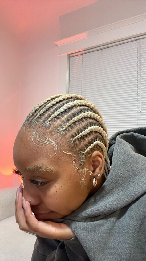 this is a photo of an African American young women with blonde cornrowed hair Cornrows On Blonde Hair, Bleached Cornrows, Blonde Hair Cornrows, Blonde Braids Black Women Cornrows, Blonde Cornrows Black Women, Cornrows With Blonde Highlights, Blond Cornrows Braids, Blonde Conrows For Black Women, Cornrow Blonde Braids