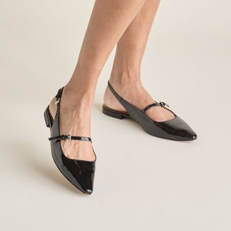 Delicate straps and a refined clipped pointed toe make this of-the-moment slingback flat simply irresistible! Classic and on-trend, black flats are a wardrobe essential and front of closet favorite for stylish women everywhere. They're comfortable, versatile, and are the perfect choice for 9-to-5 and beyond. LINEA Paolo customers also love their packability for travel and our extensive range of exclusive materials, silhouettes, and unique details. Today's featured style is CELESTE - a mini... Floral Flats, Simply Irresistible, Shoe Trends, Slingback Flats, Floral Shoes, Mary Jane Flats, Slingback Heel, Shoe Lover, Black Flats