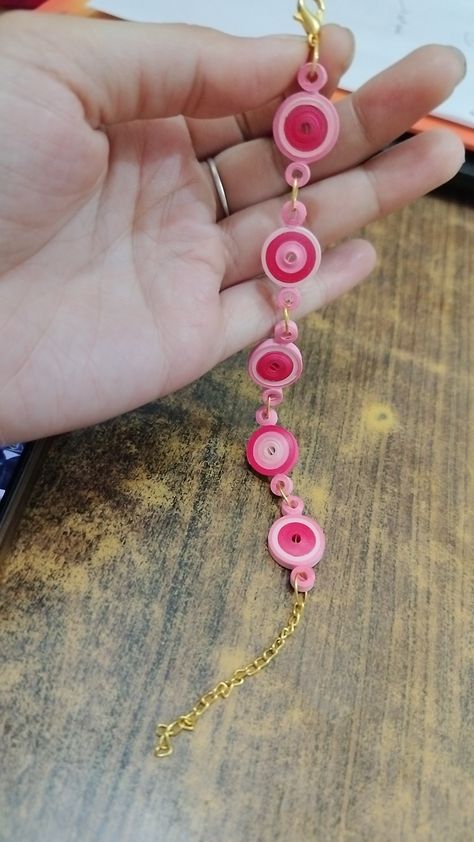 Rakhi With Quilling Paper, Paper Quilling Bracelet, Quilling Jewellery Ideas, Quilling Ideas Earrings, Quilling Rakhi Handmade, Diy Rakhi Ideas, Quilling Jewelry Ideas, Diy Rakhi Handmade Ideas, Quilling Bracelet