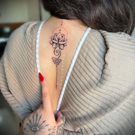 Lotus Tattoos For Women Back, Meaningful Lotus Tattoos For Women, Lotus Flower Tattoo On Back Of Neck, Neck Spine Tattoos For Women, Lotus Flower Tattoo Side Ribs, Lotus Flower Spine Tattoos For Women, Lotus Flower Tattoo Women, Lotus Flower Tattoo Spine, Lotus Spine Tattoos For Women