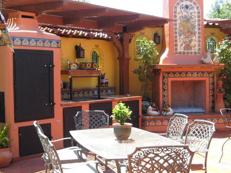 Talavera tile mural decorating outdoor patio fire place. #talaveratiles #talaveramural #mymexicantile Arched Porch, Garden Hangout, Rustic Pool, Style Hacienda, Mexican Style Homes, Mexican Style Home, Mexican Kitchen Decor, Mexican Kitchen, Hacienda Style Homes