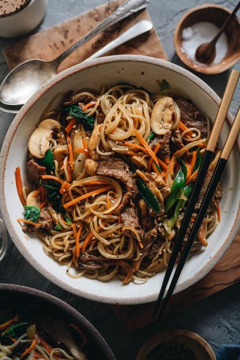 Japchae (Korean Sweet Potato Noodles) | Make japchae at home for a comforting, delicious, and nutritionally balanced weekday dinner. The tender sweet potato noodles are tossed with charred beef and crispy veggies in a sweet savory sauce. This easy recipe uses shortcuts to make the cooking process faster than the traditional recipe. {Gluten Free adaptable, vegan adaptable} Korean Sweet Potato Noodles, Kimchi Chicken, Crispy Veggies, Tasty Noodles Recipe, Koreansk Mat, Korean Sweet Potato, Potato Noodles, Asian Noodle Recipes, Mapo Tofu