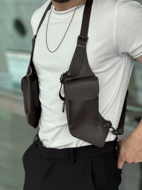 This Holster is totally handmade and produced with high quality genuine leather. - It is hand-sewed with long-lasting strings. - You can set with the adjustable strap according to your body. - Suitable for all sizes of phones and wallets. - Suitable for MALE and FEMALE use. - It is with you in 2 different color options. Mens Harness, Male Bags, Harness Bag, Holster Bag, Motorcycle Bag, Festival Bag, Cross Body Handbags, Purses And Handbags, Leather Shoulder Bag