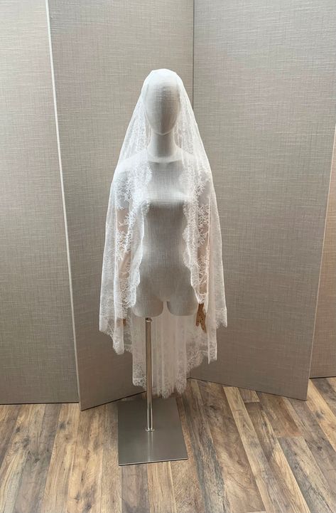 "This stunning mantilla veil with super delicate Chantilly lace will add a soft romantic touch to your wedding look. Hand made entirely with beautiful floral soft high-quality lace. The veil is secured in your hair with the comb on top of your head. This Ballet length veil measures 64\" long from the hair comb to the bottom of the veil. The color of the veil is soft white and will work with white or diamond white/light ivory dresses. Also available in the shorter length. * RETURN POLICY - We do not accept returns for a refund as all of out items are made to order. But please contact us if you are having an issue with your order. - We do accept exchanges. You can exchange your items for something else in our shop. The items you would like to exchange should be shipped back in the original c Short Lace Veil, Lace Vail, Medieval Veil, Spanish Veil, Long Veils, Mantilla Veil Wedding, Spanish Mantilla, Lace Mantilla Veil, Lace Mantilla