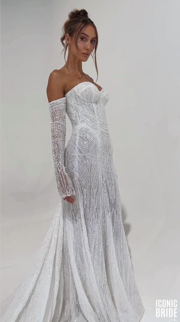 ICONIC BRIDE on Instagram: "Showstopper wedding gown! 🤩✨🤍 SICILY / A crystalline column of liquid beading, Sicily begins with a strapless bodice that flows into a cascade of shimmering lines. The gown is embellished with detachable sleeves that reach to the fingertips, the beading displaying exquisite geometry. Exquisite and Unexpected, our gowns are exclusively yours at Iconic Bride. Find your wedding dress and become an #IconicBride #IconicBrideDallas #IconicBride #iconic #DallasBridal #pallascouture #bridal #bride #weddingplanner #dallas #bridaldress #texas #weddingdress #wedding #weddingday #weddinggown #weddingphotography #texasbride #weddingfashion #weddinginspiration #weddingideas #luxurylifestyle #luxury #luxurywedding #bridetobe #weddingvenue #coutureweddingdress #weddings #da Texas Wedding Dresses, Pallas Couture, Sicily Wedding, Detachable Sleeves, Wedding Plan, Dream Wedding Ideas Dresses, Wedding Dress Couture, Beach Theme Wedding, Bridal Outfits