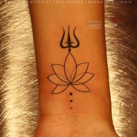 Unalome Lotus with Trishul Tattoo Tattoo by: @bharathtattooist Appointments and Bookings Contact 8095255505 "TATTOO GALLERY" "Get Inked or Die Naked'' #trishul #lotuswithreishul #reels #trendingreels #trending #viralreels #viral #viralvideos #trendingvideos #unalome #tattoo #unalometattoo #tattoos #ink #lotus #unalomes #art #tattooed #inked #tattooartist #mandala #lotustattoo #tattooart #dotwork #unalomelotus #tattooideas #tattoo #blacktattoo #spirituality #tattoodesign #bharathtattooist Simple Trishul Tattoo Designs, Unalome Lotus, Trishul Tattoo Designs, Trishul Tattoo, Unalome Tattoo, Lotus Tattoo, Tattoos Gallery, Small Tattoo, Tattoo Tattoo