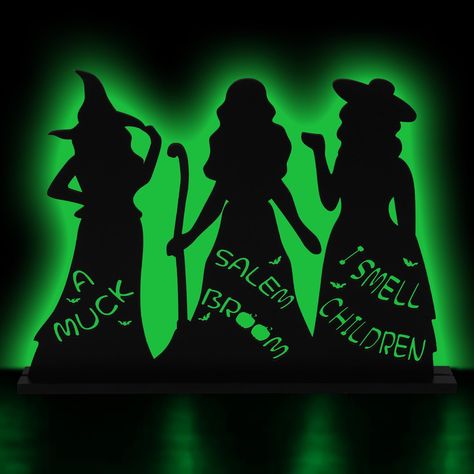 PRICES MAY VARY. Quality Material: This hocus pocus halloween decor are made of quality wood, which are reliable and sturdy enough for you to use for a long time, not easy to deform. Detailed Dimensions: The wood witches size 13.4 inches * 10.2 inches, the rectangle base is 14 inches *1.57 inches. Suitable for decorating various places to enhance halloween atmosphere. Unique Design: Our Witch Halloween wood Tabletop with black silhouettes theme, with the hollow words "A MUCK", "SALEM BROOM", and Witches Table, Witch Centerpiece, Hocus Pocus Sign, Hocus Pocus Halloween Decor, Indoor Halloween Decor, Wooden Table Decor, Black Witches, Halloween Hocus Pocus, Halloween Party Decoration