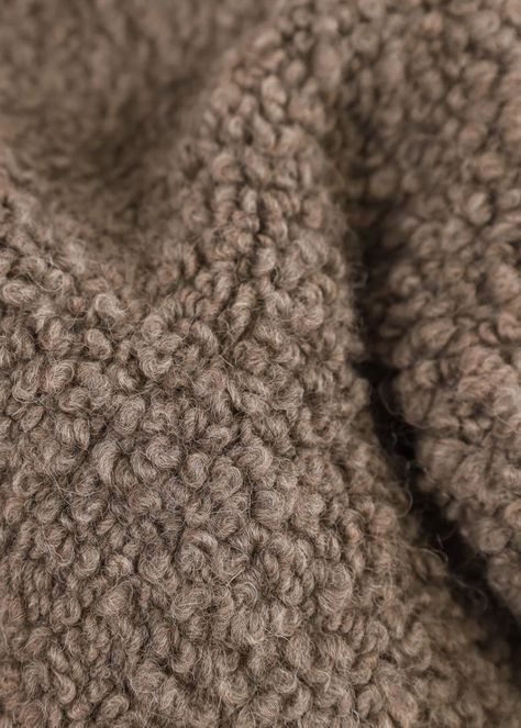 One of our favorite pieces to date. The Suri boucle throw is our softest and most luxurious throw. Made in Belgium out of alpaca and wool, the tight curly boucle texture is incredibly plush and cozy. The throw is dense, heavy in weight and made using traditional weaving techniques. Origin: Belgium Manufacturing: Woven Material: 45% Alpaca Wool, 44% Wool, 11% Cotton Colors: Mink, Umber, Ivory & Black Condition: New. Wear and inconsistencies are unique to the original item. Dimensions: Medium: 66. Fall Feeling, Wool Texture, Alpaca Throw, Sweater Ideas, Wool Textures, Suri Alpaca, Concept Board, Alpaca Fiber, Material Textures