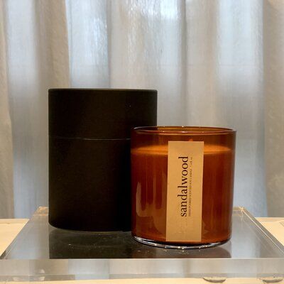 A lingering and exotic woody scent with a touch of rose. | Atelier 880 Sandalwood Scented Jar Candle Brown 5.0 x 4.0 x 4.0 in | ATIE1034 | Wayfair Canada Scented Oil Diffuser, Sandalwood Scent, Glass Packaging, Oil Candles, Scented Oils, Flameless Candles, Jar Candle, Glass Holders, Patio Furniture For Sale