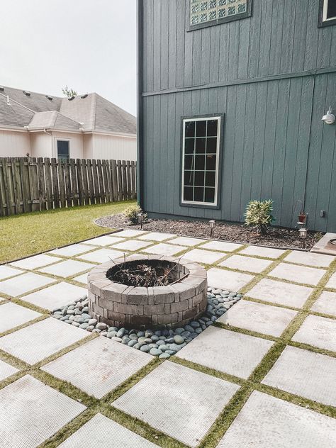 DIY patio with grass between pavers and a fire pit! Patio With Pavers And Fire Pit, Paver Fire Pit Diy, Paving Stone Fire Pit Area, Grill Paver Patio, Outdoor Patio With Pavers, Narrow Long Backyard Ideas, Diy Back Patio Ideas, Pavers Fire Pit Area, Cheap Paver Patio Ideas