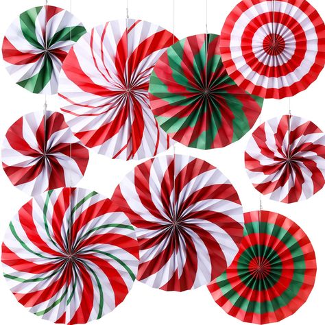 PRICES MAY VARY. Package Included: comes with 9 pieces of candy paper fans in different patterns, available in 3 sizes, the rich design and sizes hang lots together for a gorgeous visual display; Add a happy atmosphere to your home and party Paper Fans Size: there are 3 different size of Christmas hanging fans for you to choose, 8 inch/ 12 inch/ 16 inch, 3 pieces of each size, the proper size for both kids and adults Easy to Assemble: you simply unfold each Christmas peppermint hanging decoratio Christmas Classroom Decorations, Christmas Party Candy, Classroom Christmas Decorations, Candy Paper, Paper Fan Decorations, Work Holiday Party, Party Girlande, Holiday Classroom, Paper Christmas Decorations