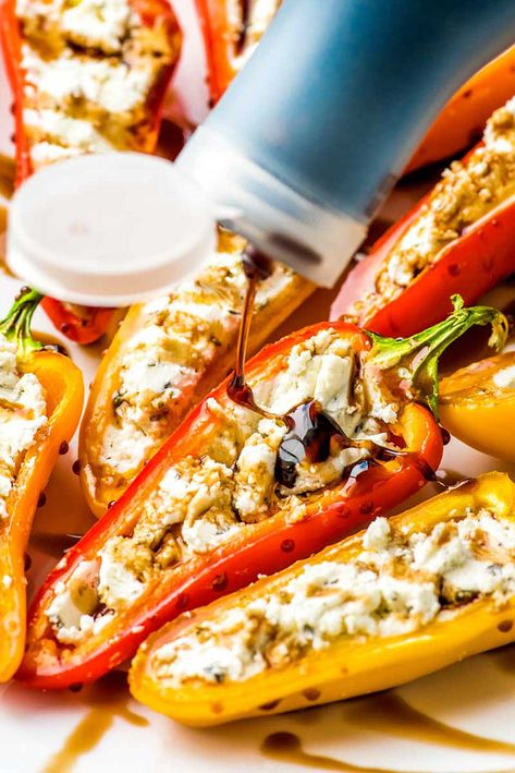 Goat Cheese Stuffed Mini Peppers! Tender sweet mini peppers filled with the pleasantly fresh (yet lightly tangy!) flavor of goat cheese and drizzled with balsamic reduction. | #ad #JoanofArcGoat @joanofarcbrie HomemadeHooplah.com Cheese Stuffed Mini Peppers, Mini Peppers Recipes, Sweet Pepper Recipes, Mini Peppers, Mini Sweet Peppers, Grilled Peppers, Goat Cheese Recipes, Bell Pepper Recipes, Cheese Stuffed Peppers