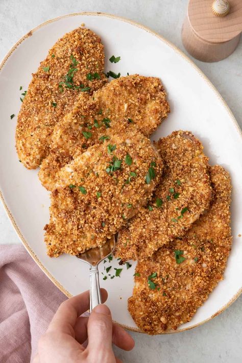 This Almond Crusted Chicken is crunchy and juicy, ready in 30 minutes with only a few ingredients, perfect for busy weeknight dinners! | Almond Crusted Chicken | Baked Almond Crusted Chicken | Almond Crusted Chicken Breasts Recipe | How to Make Almond Crusted Chicken | Easy Almond Crusted Chicken | Easy Chicken Recipes | Weeknight Chicken Dinner | Almond Baked Chicken, Almond Flour Crusted Chicken, Chicken Almondine Recipes, Almond Chicken Recipes, Chicken Almondine, Feelgoodfoodie Recipes, Carnivore Ideas, Almond Crusted Chicken, Chicken Oven