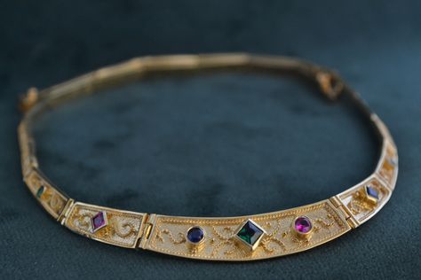 This unique necklace is inspired by Byzantine jewelry. It is made with solid Sterling Silver (925 Silver), and has a 22K Gold-plating all over. The necklace is also enriched with Cubic Zirconia stones of various colours. Medieval Necklace, Hand Jewelry Rings, Ethereal Jewelry, Byzantine Jewelry, Byzantine Necklace, Neck Pieces Jewelry, Princess Jewelry, Medieval Jewelry, Jewelry Lookbook