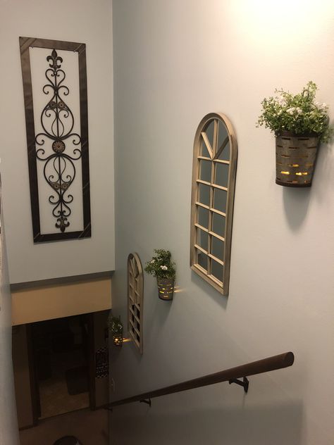 Top Of Stairway Wall Decor, Diy Stair Wall Decor, Wall Up The Stairs Decor, Down Stairs Decor Ideas, Stair Decorating Ideas Wall Stairways, Above Staircase Decor, Ideas For Decorating Stairway Walls, End Of Staircase Decor, High Stairway Wall Decor