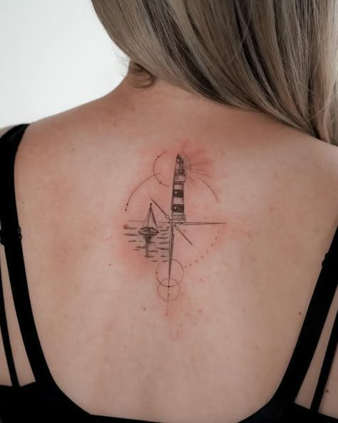 Lighthouse And Compass Tattoo, Travel Tattoo Ideas For Women, Middle Of Back Tattoo, Lighthouse Tattoo Meaning, Nautical Compass Tattoo, Pointillism Tattoo, Travel Tattoo Ideas, Circular Tattoo, Sailboat Tattoo