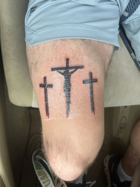 Christian Leg Tattoo Men, Cross Leg Tattoo, Small Christian Tattoos For Men, Men's Leg Tattoos, Three Crosses Tattoo Design, Above The Knee Tattoo Men, Quad Tattoo For Men, Upper Leg Tattoos, Leg Tats