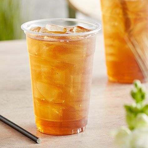 This Tazo black iced tea concentrate makes it easy to create premium iced teas with no brewing required! Made with premium black tea, this unsweetened concentrate delivers a crisp, refreshing flavor when prepared. It does not contain any artificial colors, flavors, or preservatives, promising no unpleasant, syrupy aftertaste. This concentrate is ideal for restaurants, bakeries, cafes, and bars looking for an easy and profitable way to offer trendy and tasty beverages.  Each 32 fl. oz. carton can Iced Tea Concentrate, Black Iced Tea, Es Campur, Tea Concentrate, Food Business Ideas, Black Ice, Ice Tea, Drink Menu, Tea Shop