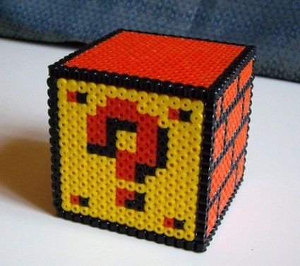 This question mark block has extended its form into the fabled third dimension! This mysterious realm of depth is unexplored by either 8-bit explorers or Perler... Perler Bead Mario, Pokemon Project, Perler Creations, Kleenex Box Cover, Melty Bead Patterns, Inanimate Objects, Hamma Beads, Rubik's Cube, Fuse Beads