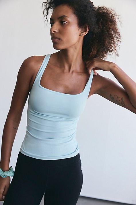 With a barely-there feel and so sleek fit, this essential active tank features a full-length fit with a high-neckline and breathable details. * 4-way stretch fit * Won’t ride up as you work out * Lightweight, non-bulky style | Good Karma Long Tank Top by FP Movement at Free People in Mint Momentum, Size: XS/S Long Tank Top, Outfit Inso, Tøp Aesthetic, Long Sleeve Layer, Free People Tank Top, Free People Activewear, Long Tank Tops, Good Karma, Long Tank